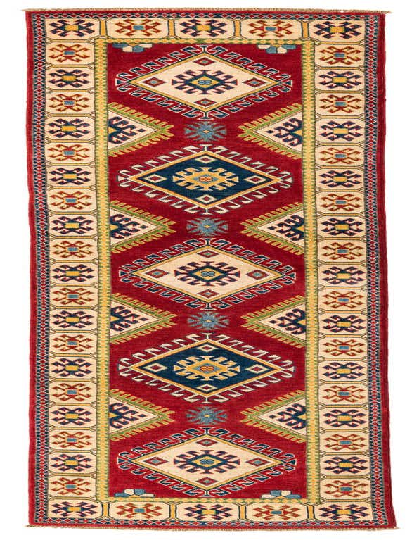 A 10 Ft runner rug with a vibrant red background, featuring large cream and navy blue geometric medallions and a multi-colored border, ideal for a hallway.