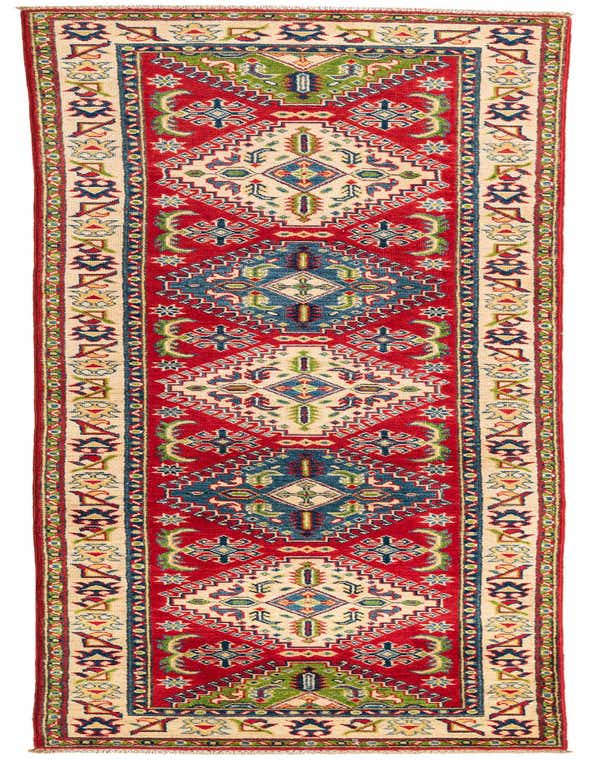 A 10 ft runner rug with a traditional Southwestern pattern in vibrant reds, blues, greens, and cream, ideal for a hallway.