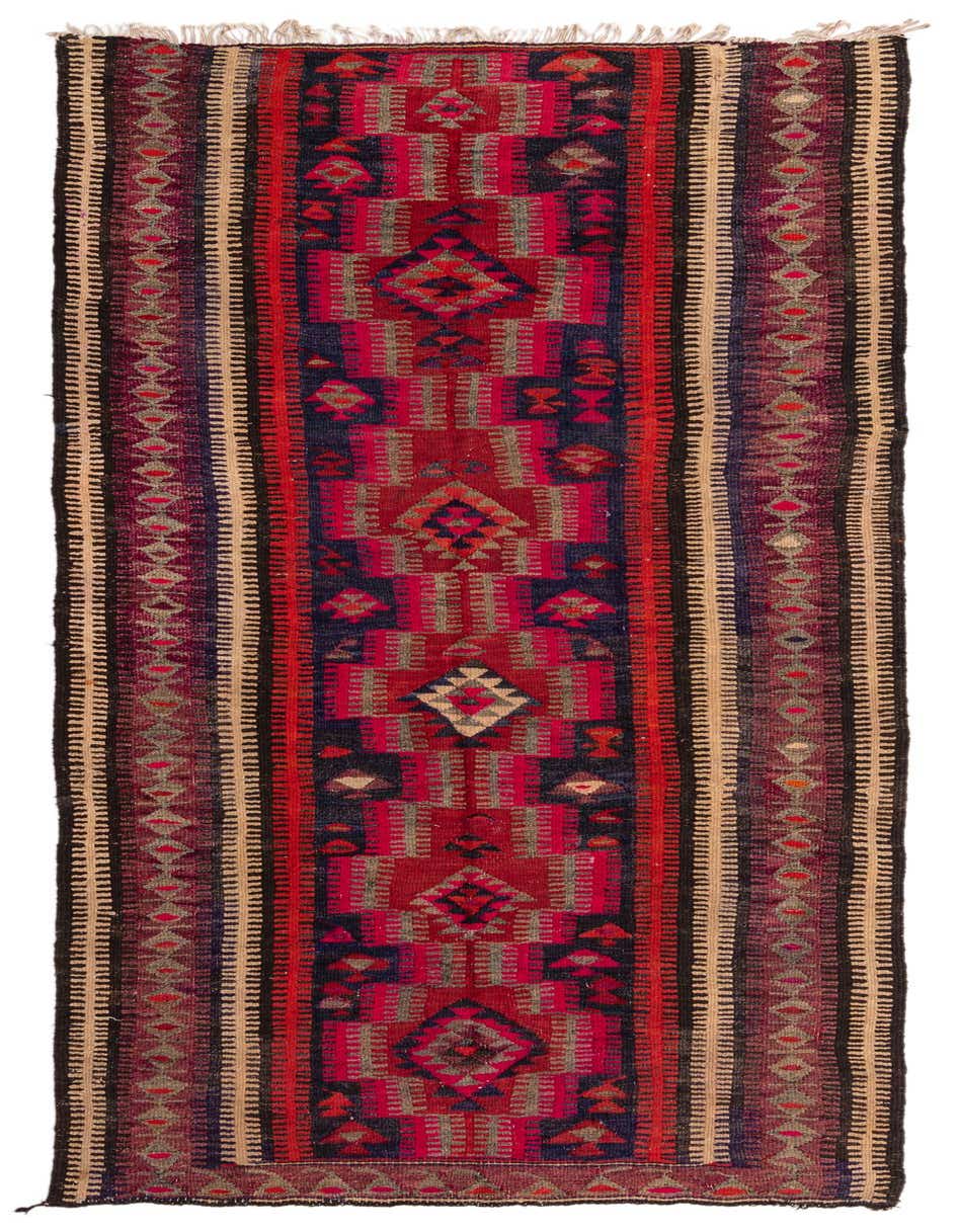 A 10 Ft Kilim Fars runner rug with a flatweave, featuring a vibrant tribal pattern in reds, blues, and natural tones, ideal for a hallway.