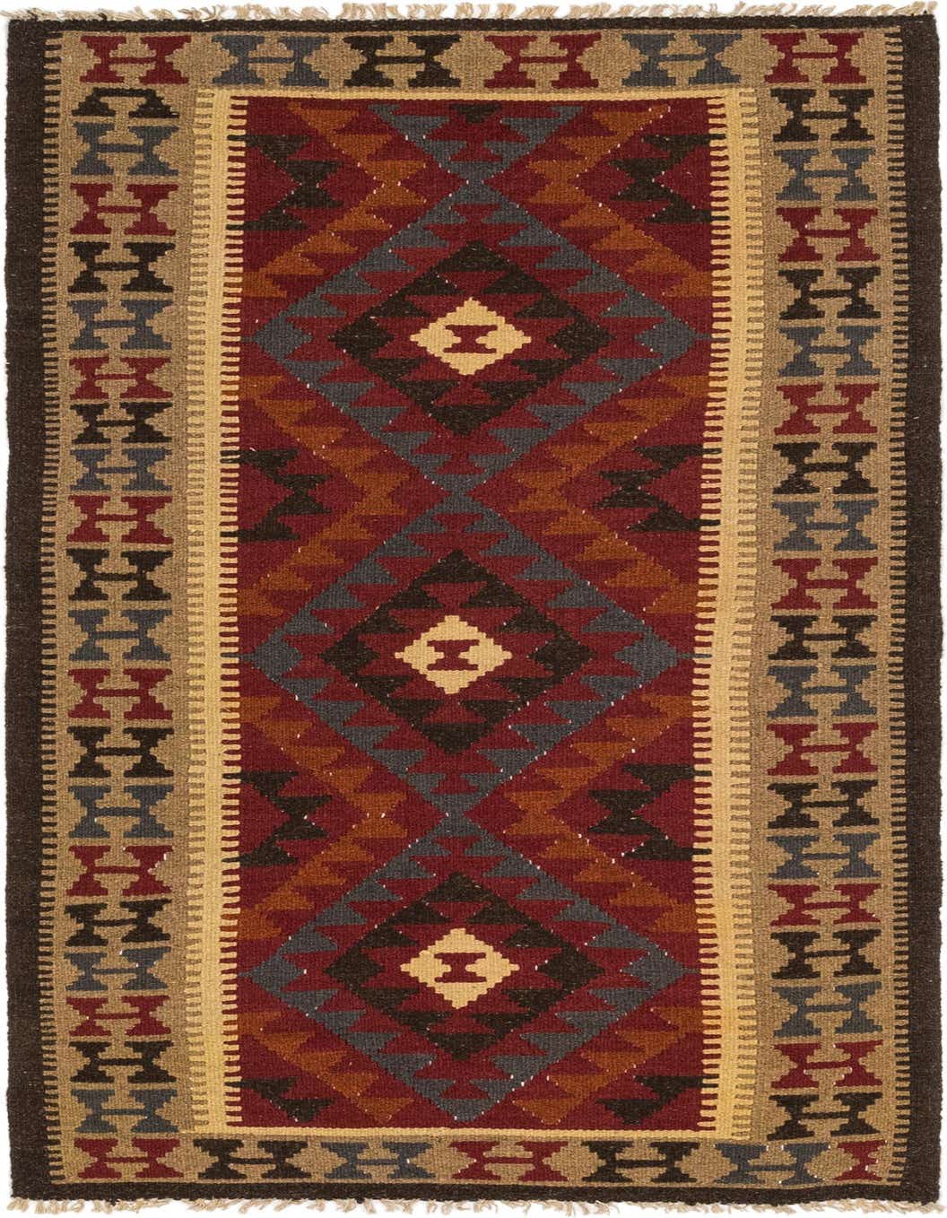 A 6 ft runner rug with a Southwestern, tribal pattern in shades of red, brown, gold, and gray.