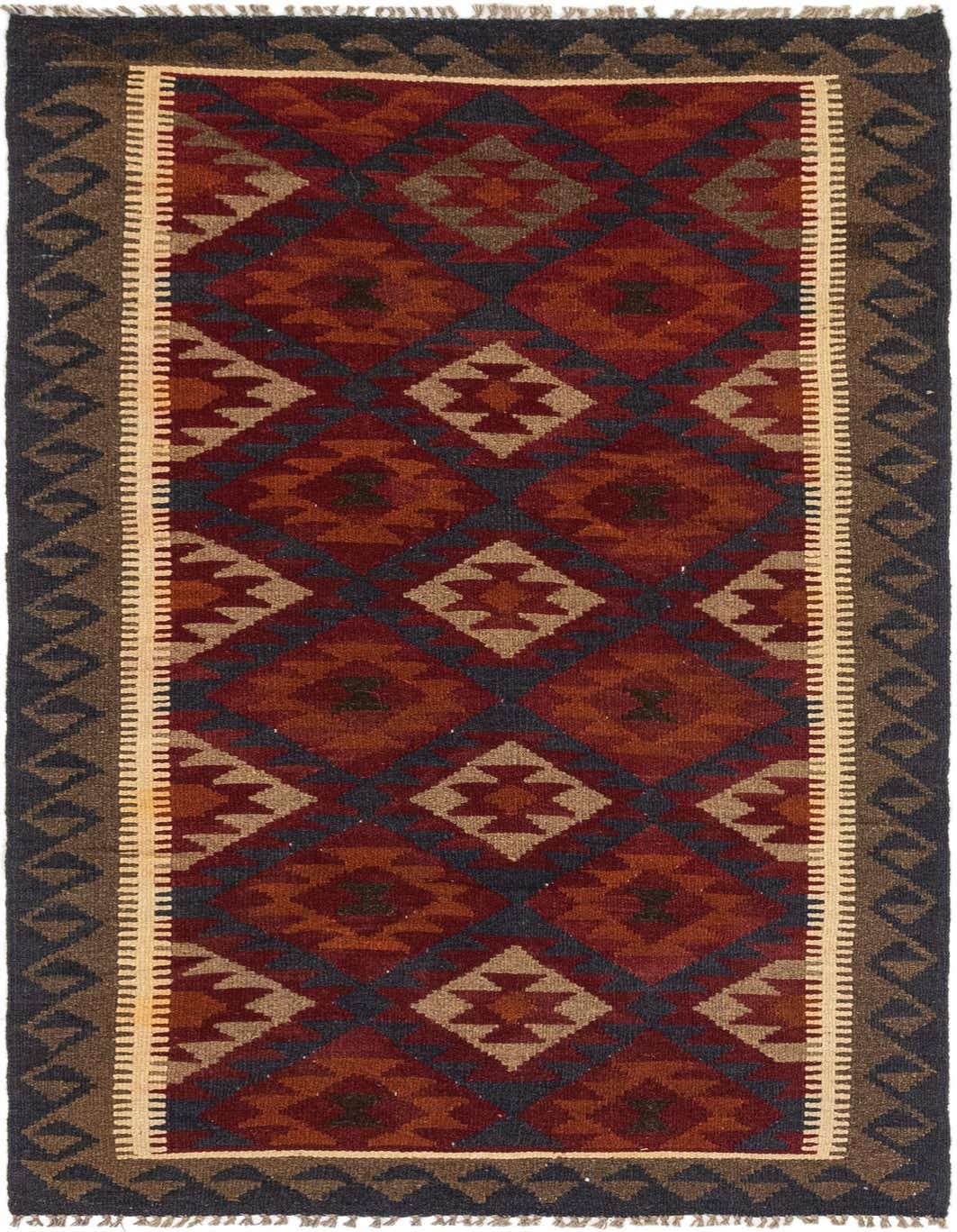 A 6 ft runner rug with a Southwestern tribal pattern in shades of red, brown, and dark gray, featuring geometric diamonds and a decorative border.