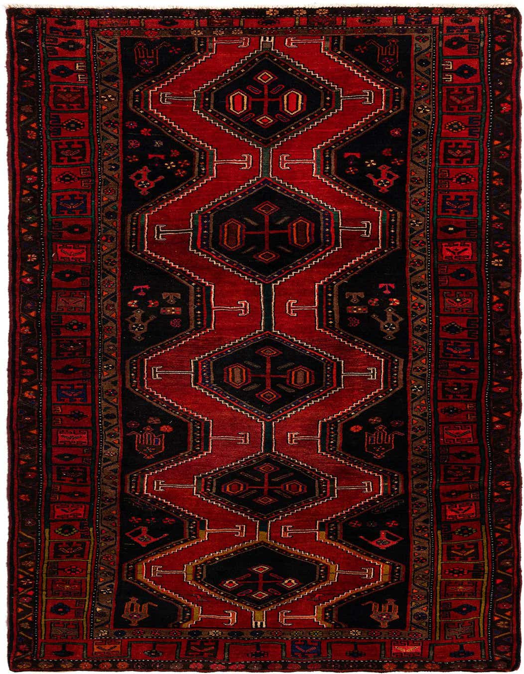 A handmade 11 ft runner rug featuring a tribal Persian design in deep reds and black, ideal for a hallway.
