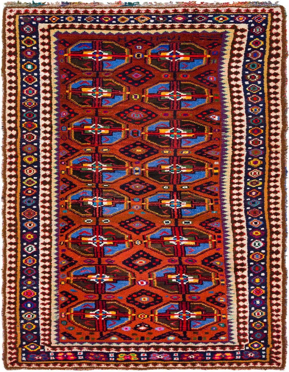 A 12 ft red wool runner rug with a tribal geometric pattern in blues, blacks, and yellows, perfect for a hallway.