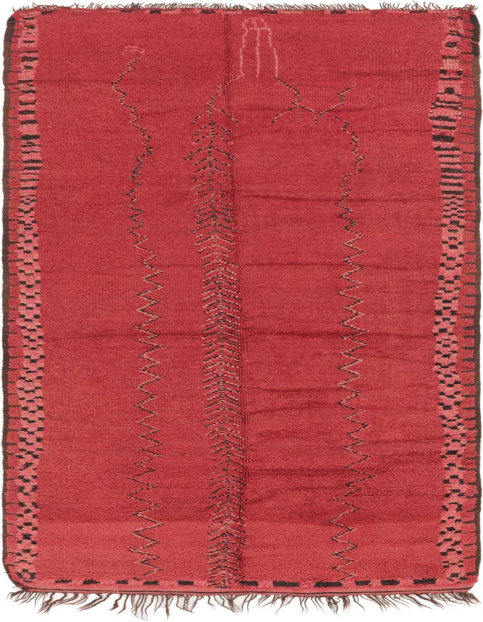 A 12 ft runner rug in deep red with black tribal and zigzag patterns, featuring a plush shag pile.