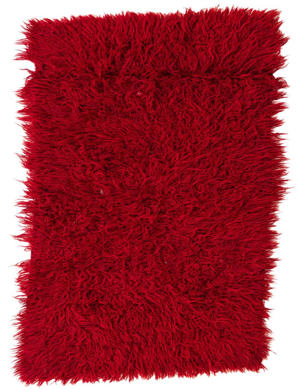A plush, shaggy 6 ft runner rug in a vibrant red color, made from 100% wool, perfect for a hallway.