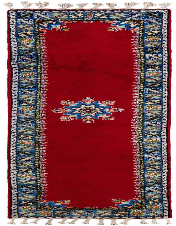 A 10 ft red Moroccan runner rug with a central medallion and tribal blue and white border, perfect for a hallway.