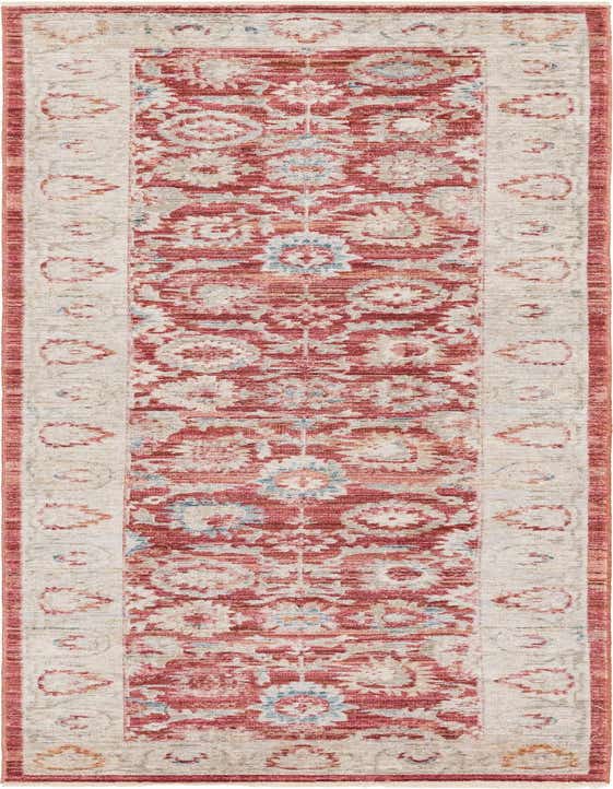 A 10 ft runner rug in shades of red, cream, and light blue, featuring a distressed traditional floral pattern with a bordered edge, ideal for a hallway.