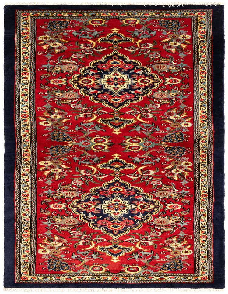 A 7 ft runner rug in a traditional Persian style, featuring a vibrant red field with intricate floral and medallion patterns in navy, gold, and cream.
