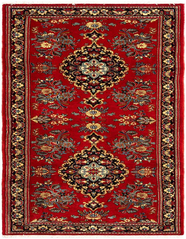 A handmade 8 ft runner rug in a traditional Persian style, featuring a rich red field with intricate floral and medallion patterns in black, blue, and gold.