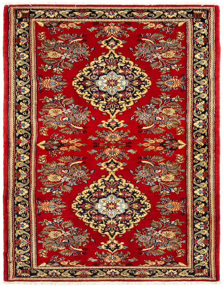 A handmade 7 ft runner rug in a rich red with intricate Persian and Oriental floral patterns, ideal for a hallway.