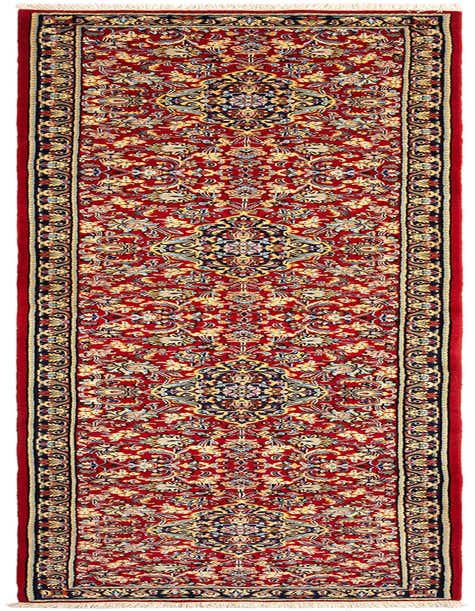 A 13 ft red Persian runner rug with intricate floral and medallion patterns in blue, gold, and cream, ideal for a hallway.