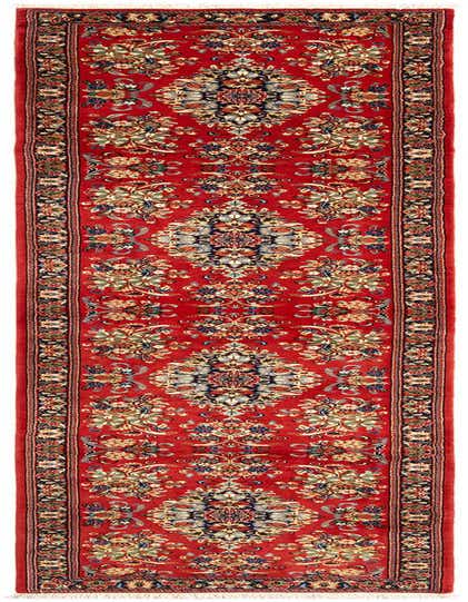 A 13 ft handmade red Persian runner rug with intricate floral and medallion patterns, ideal for a hallway.