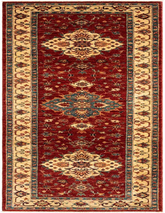 A 9 ft runner rug with a deep red field and intricate Persian floral patterns in cream, blue, and gold, ideal for a hallway.