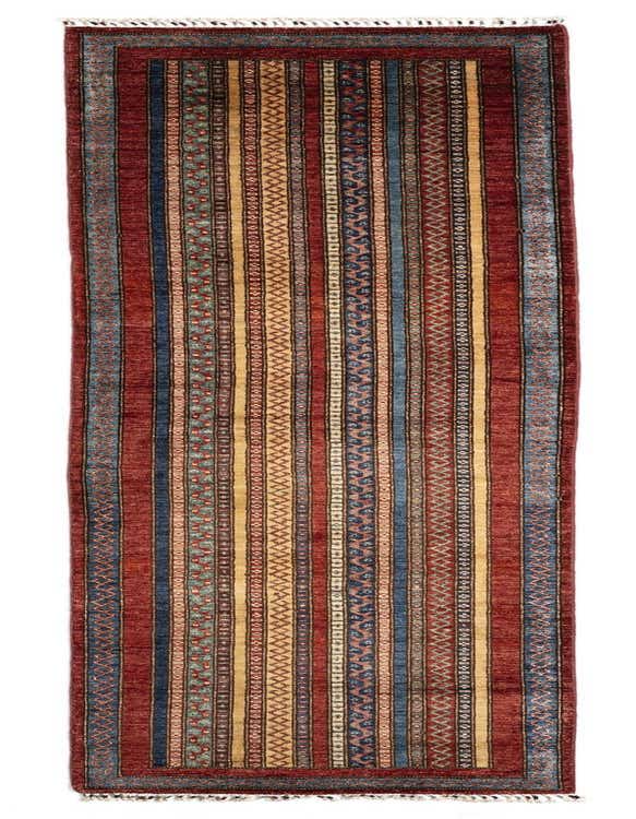 A handmade 11 ft Schall Persian runner rug in rich reds, blues, and gold with intricate striped patterns, perfect for a hallway.