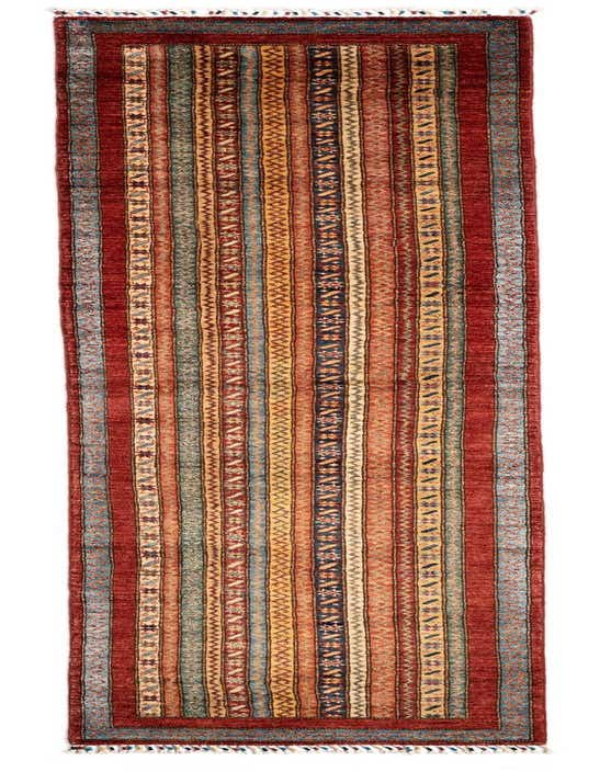 A handmade 11 ft Schall Persian runner rug in various shades of red, blue, and gold with intricate striped patterns.
