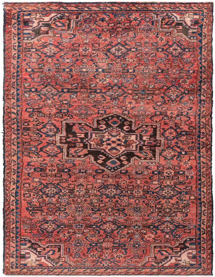 A 10 Ft runner rug featuring a distressed Persian medallion pattern in shades of red, navy, and black.
