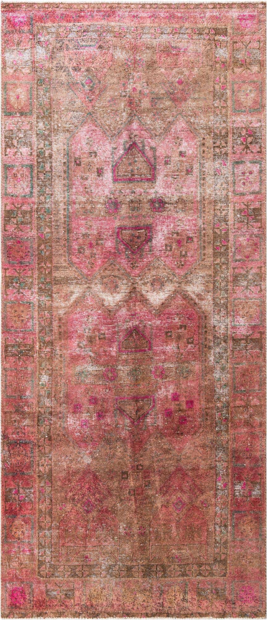 A handmade 11 ft runner rug from the Ultra Vintage collection, featuring a distressed Persian pattern in shades of red and brown, ideal for a hallway.