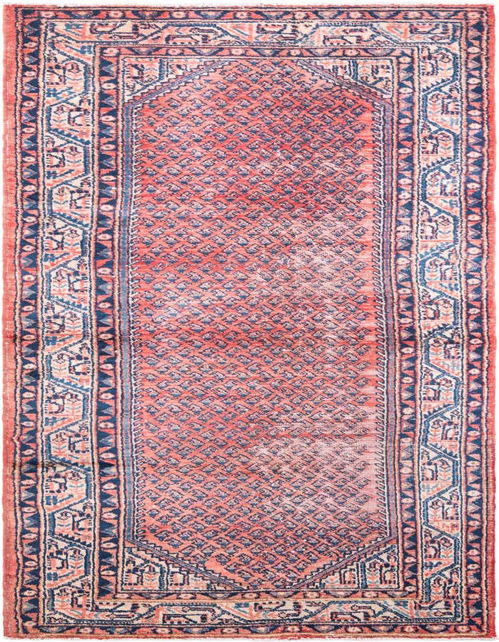 A 10 ft runner rug in a vintage Persian style, featuring a faded red field with small blue geometric patterns and a detailed blue and cream border.