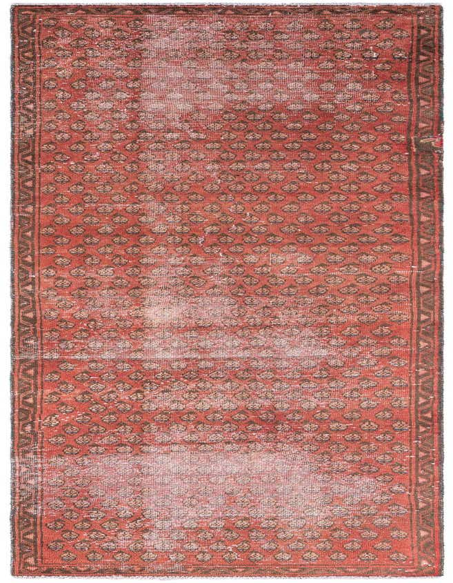 A 9 ft runner rug in shades of red with a distressed vintage Persian pattern and a dark border, ideal for a hallway.