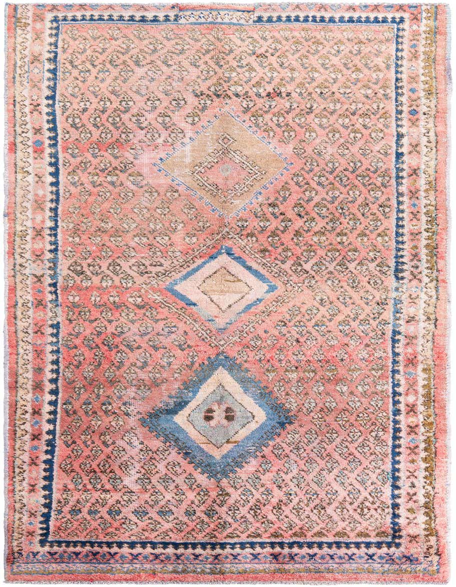 A 10 ft runner rug in a vintage Persian style, featuring a distressed red field with blue and beige diamond medallions and intricate border patterns.