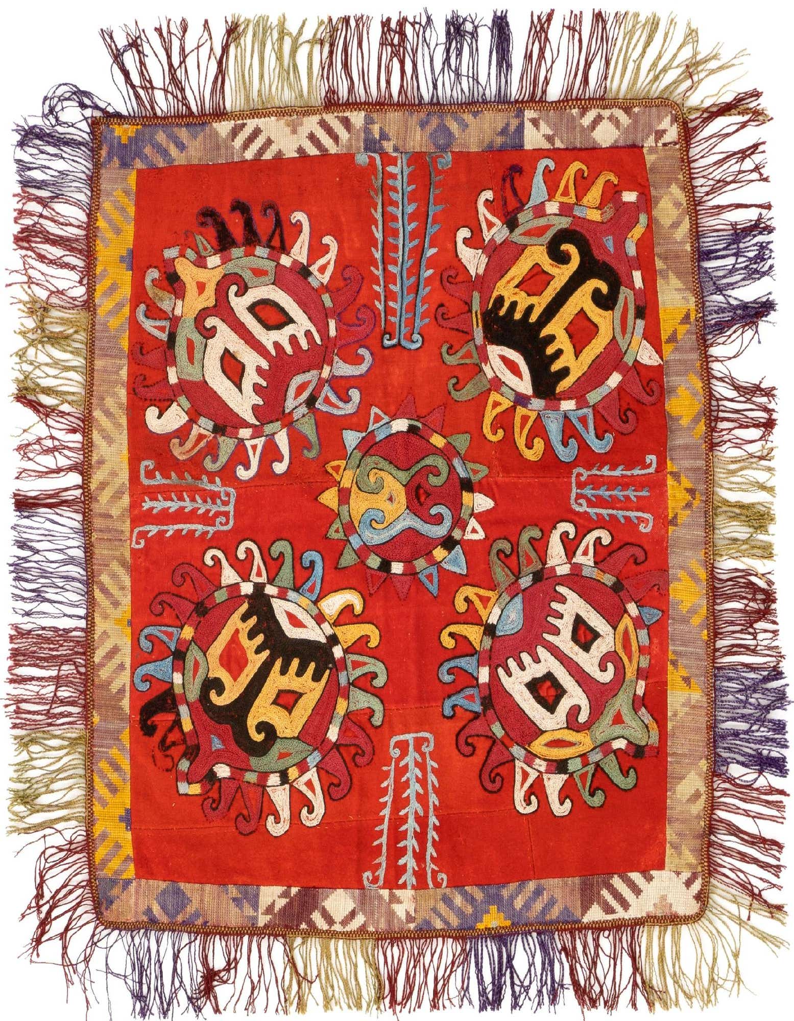 A 1' 7 x 1' 10 square red Persian rug with colorful sun-like medallions and fringed edges.