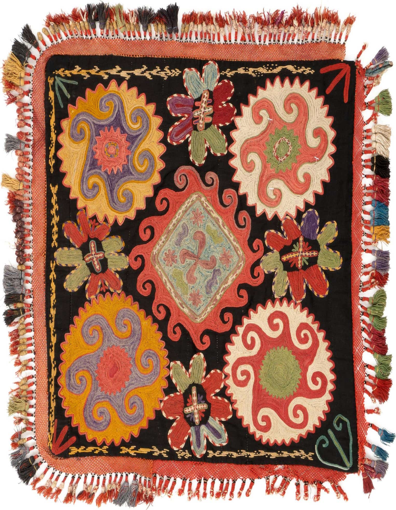 A 2'x2' square Lakai Persian rug featuring a black background with vibrant red, yellow, purple, and green floral and geometric embroidery, framed by red fringe.