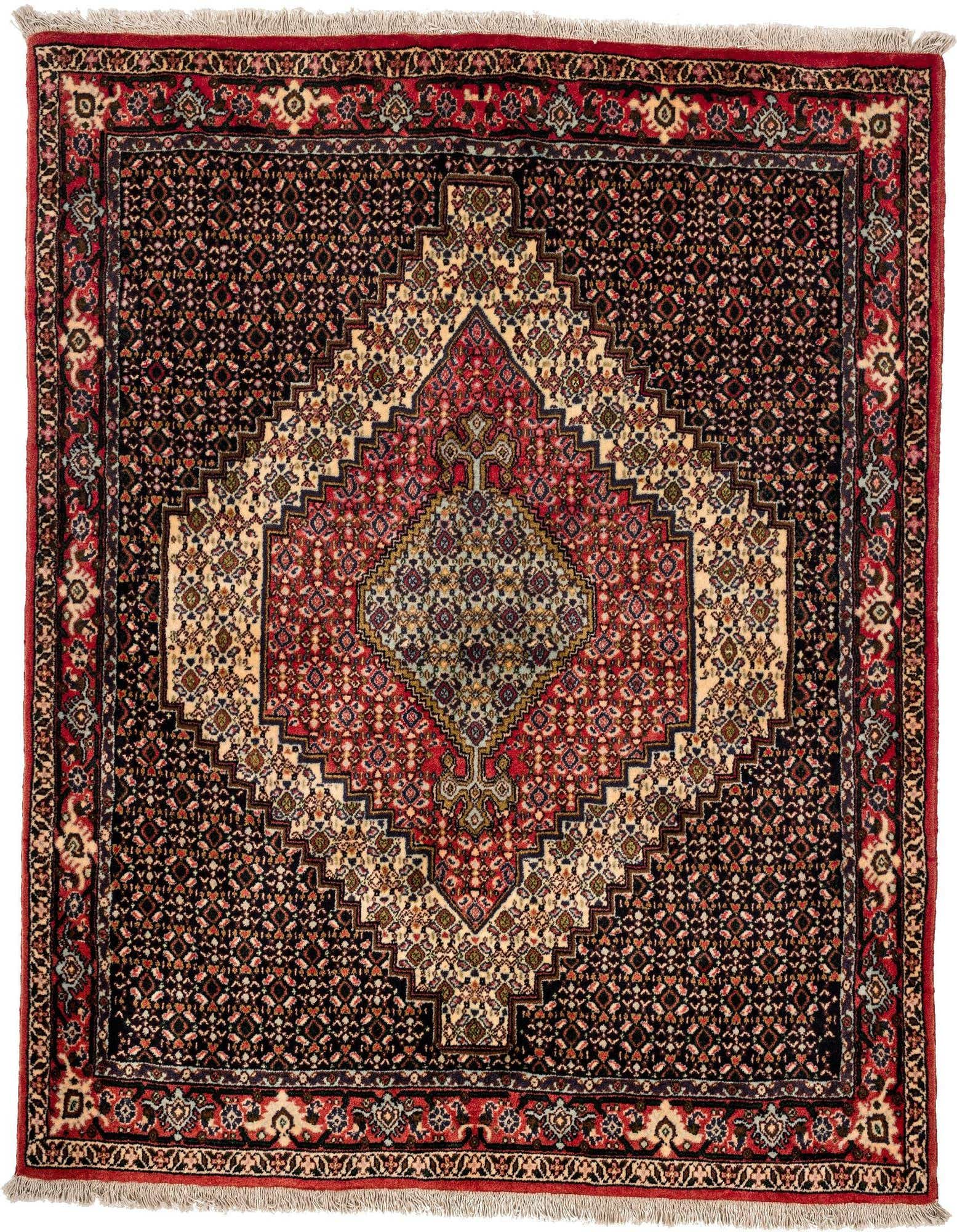 A square 4' 0 x 4' 9 Senneh rug featuring a central medallion in red, cream, and blue on a dark background, with intricate traditional patterns.