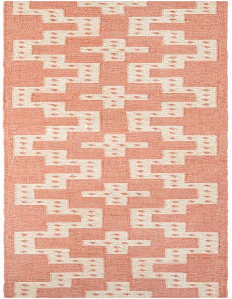 A 12 ft red runner rug with a repeating modern tribal pattern in cream, perfect for a hallway.