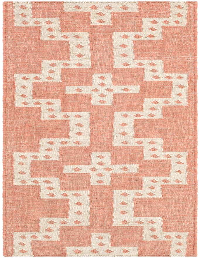 A 6 ft runner rug with a red background and a cream tribal geometric pattern, perfect for a hallway.