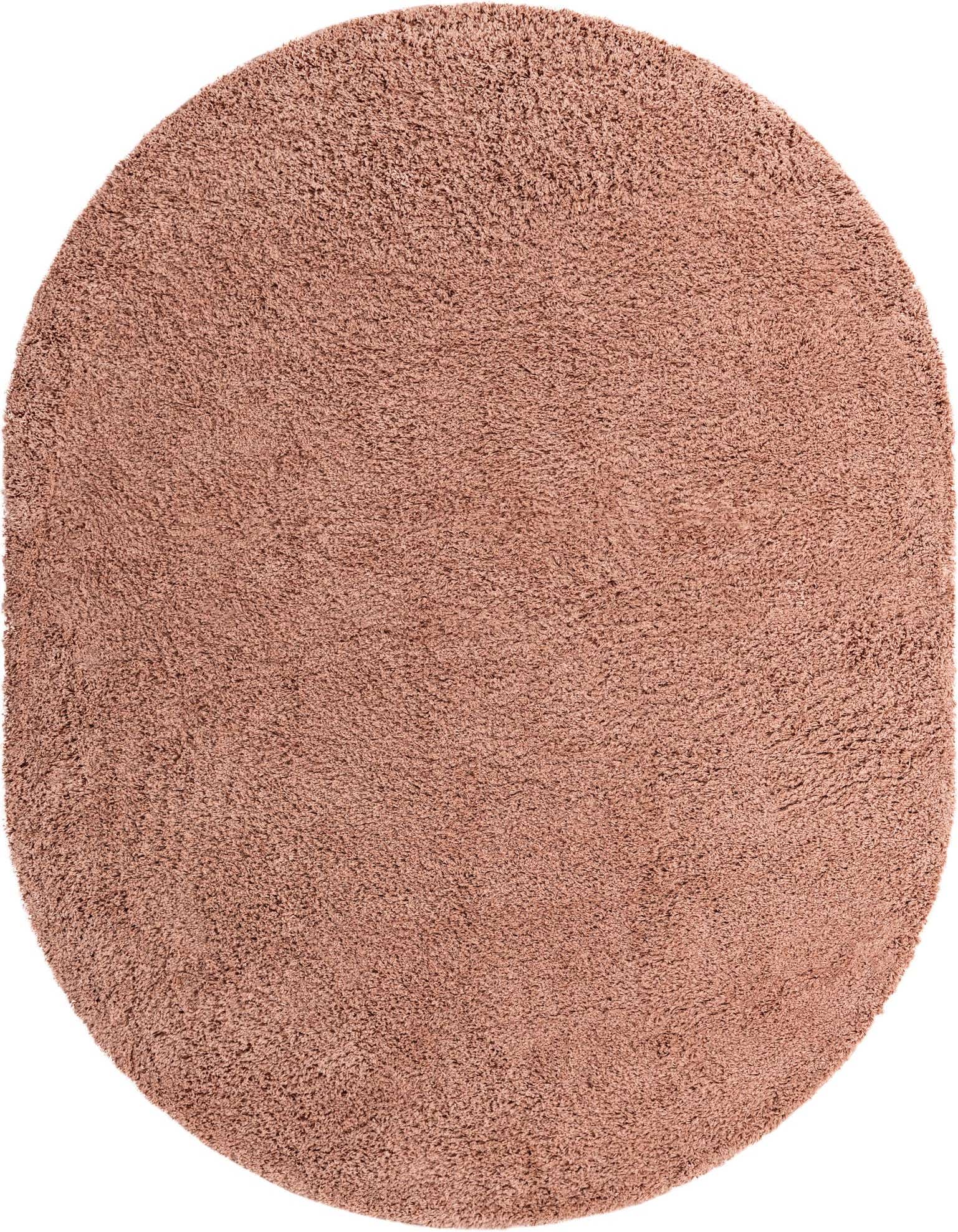 An 8' x 10' oval shag rug in a soft pinkish-red hue, showcasing its plush, textured pile.