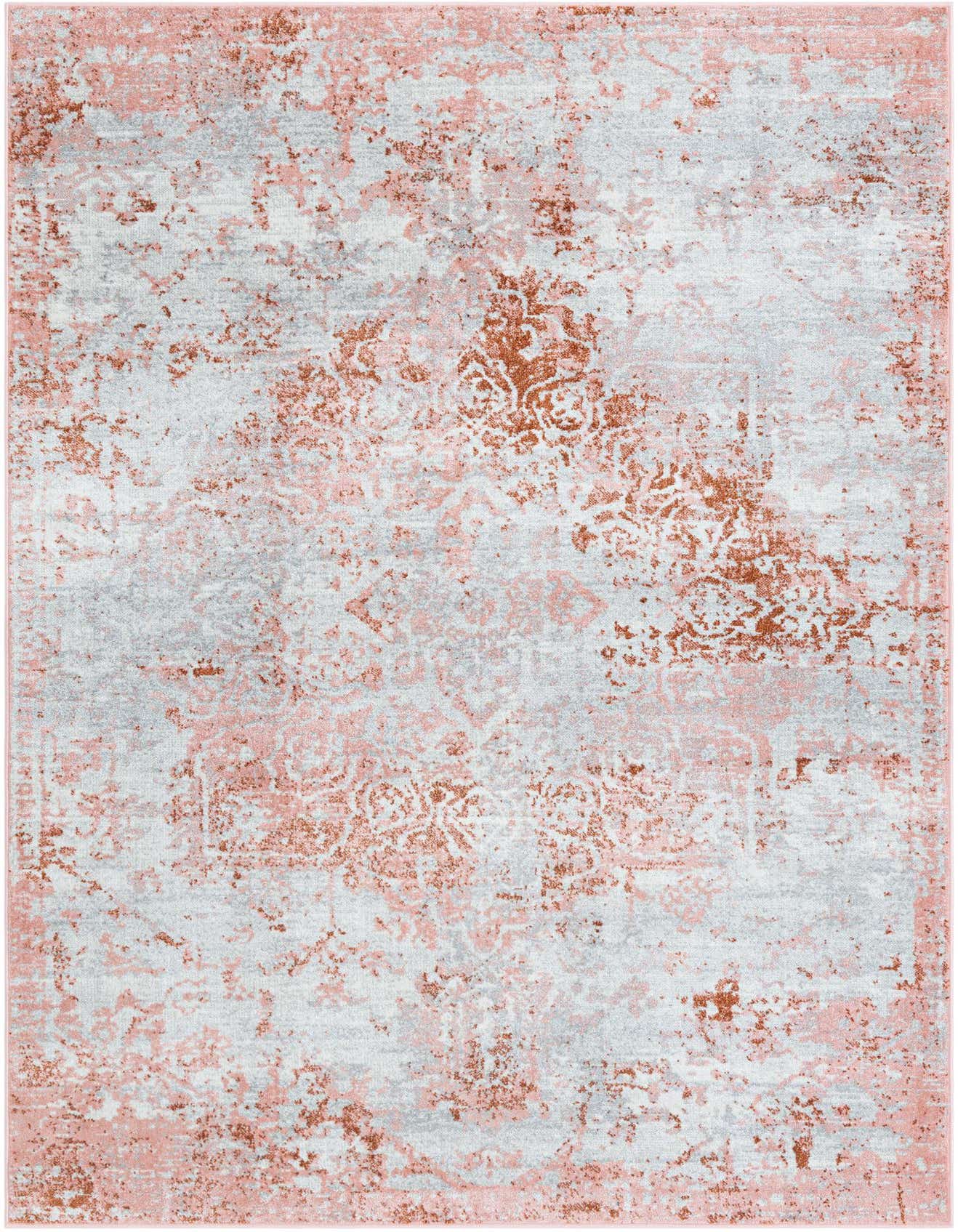 A 6x9 rectangular Kamala Washable rug featuring a distressed traditional medallion pattern in pinks, reds, and light gray.