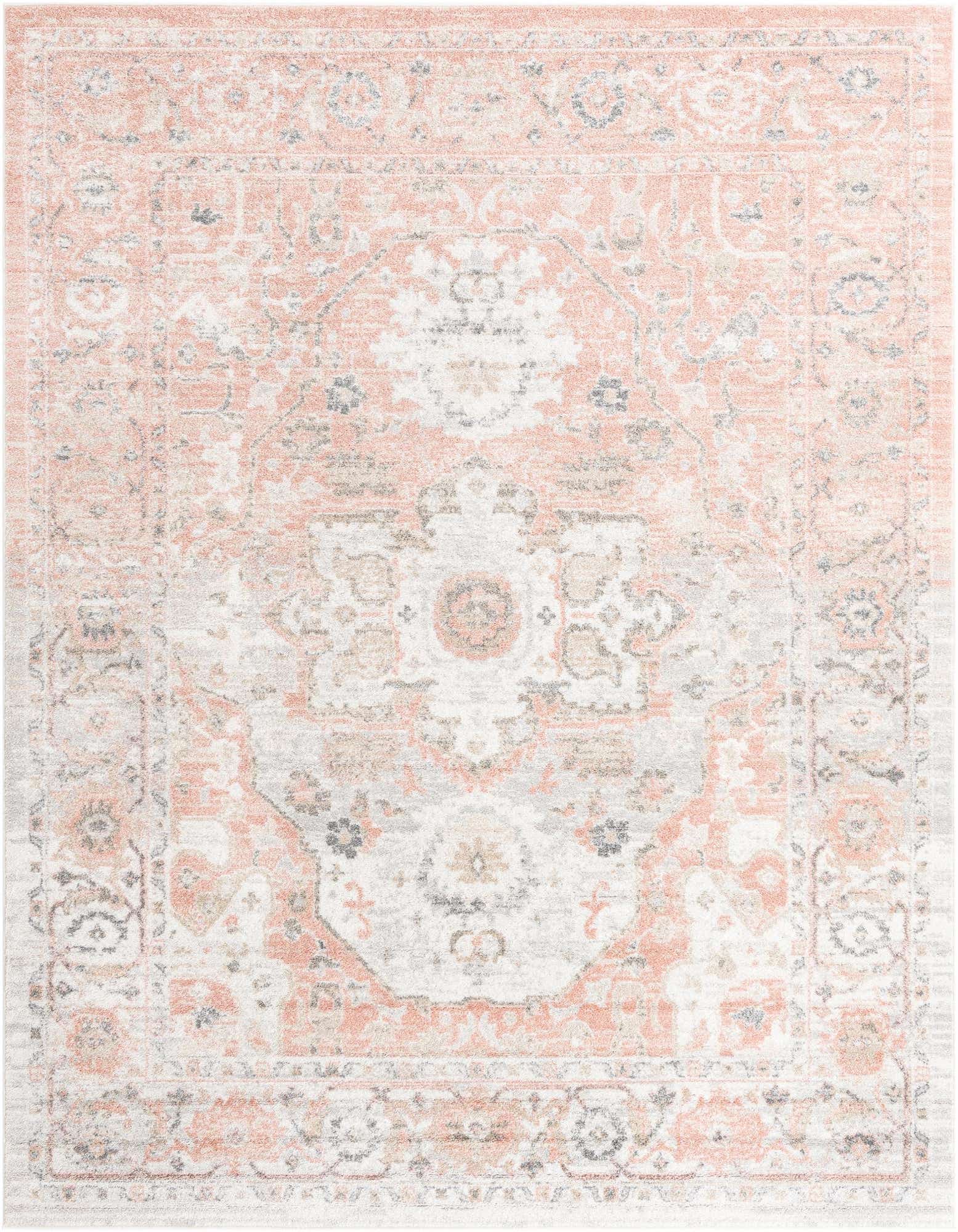 An 8x11 rectangular Madeline Vintage rug featuring a distressed traditional medallion pattern in soft pinks, reds, and creams.