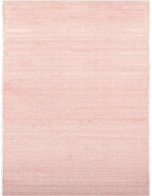 A long, rectangular 16 ft runner rug in a solid light pink color with a subtle textured modern weave, perfect for a hallway.