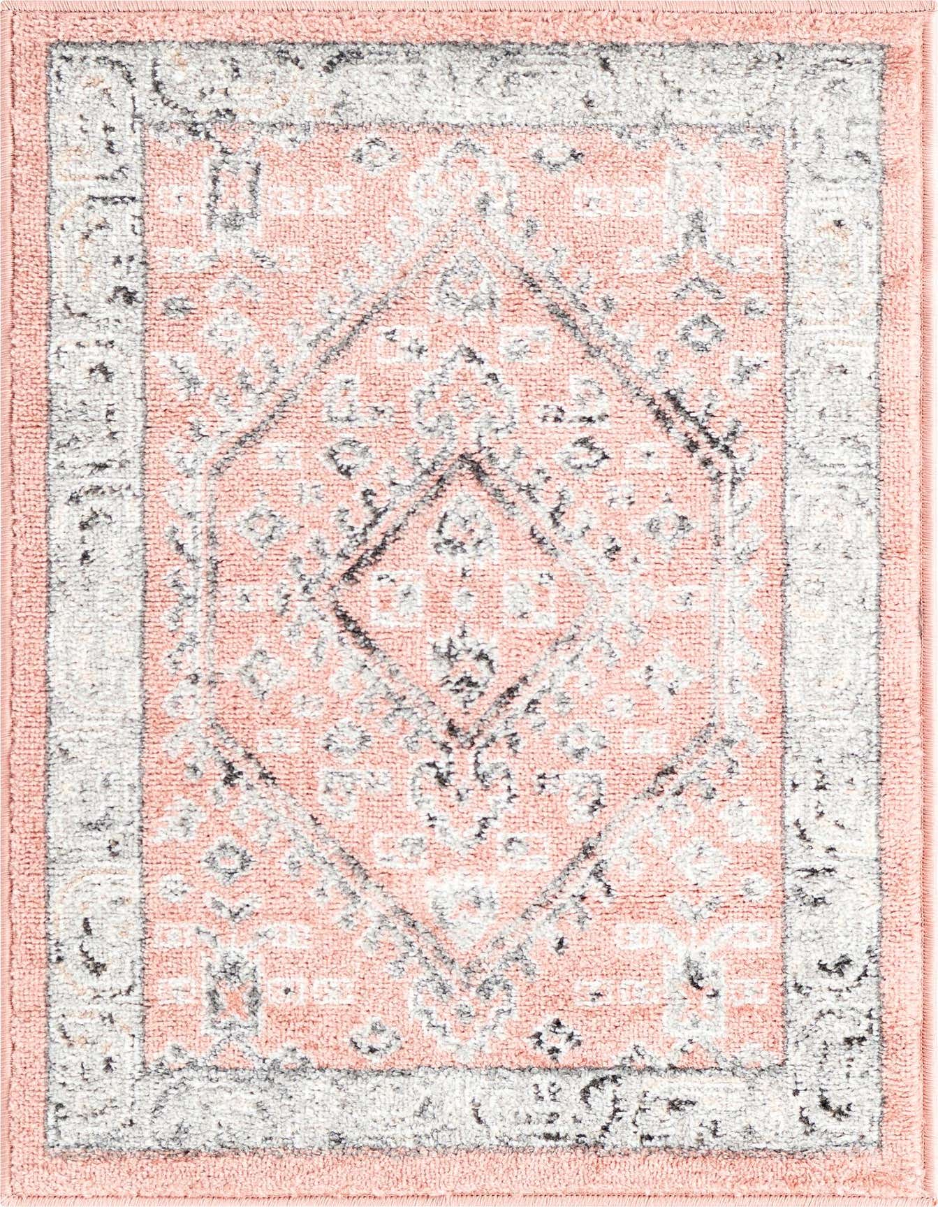 A 2x3 rectangular Aurelia rug in shades of pink, grey, and white with a traditional medallion pattern.