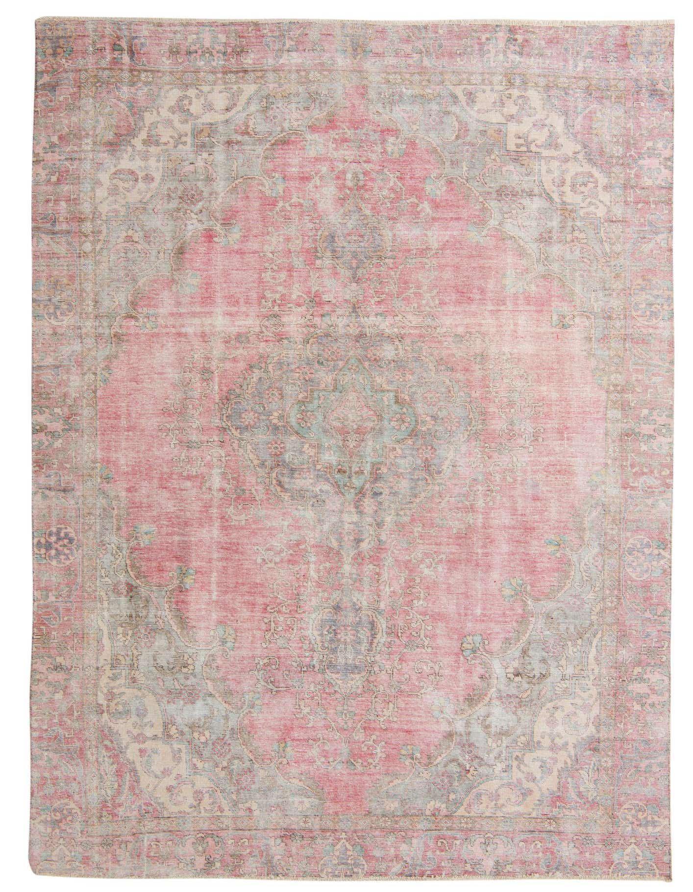 A rectangular 8x12 Ultra Vintage rug featuring a faded red field with an intricate blue and cream Persian medallion pattern.
