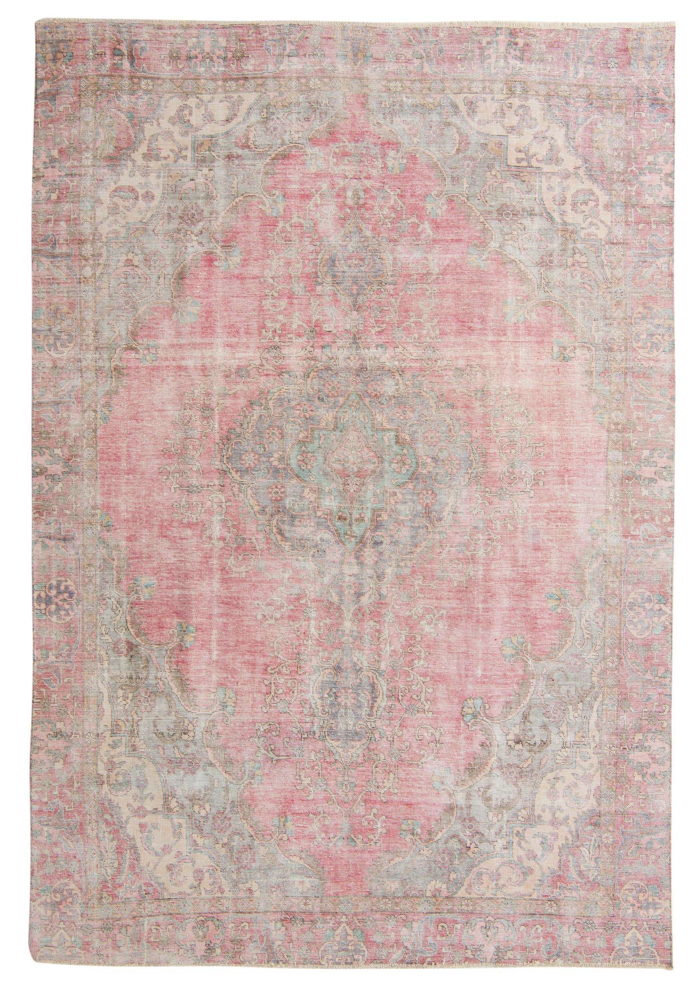 A rectangular 8x12 Ultra Vintage rug featuring a faded red field with an intricate blue and cream Persian medallion pattern.