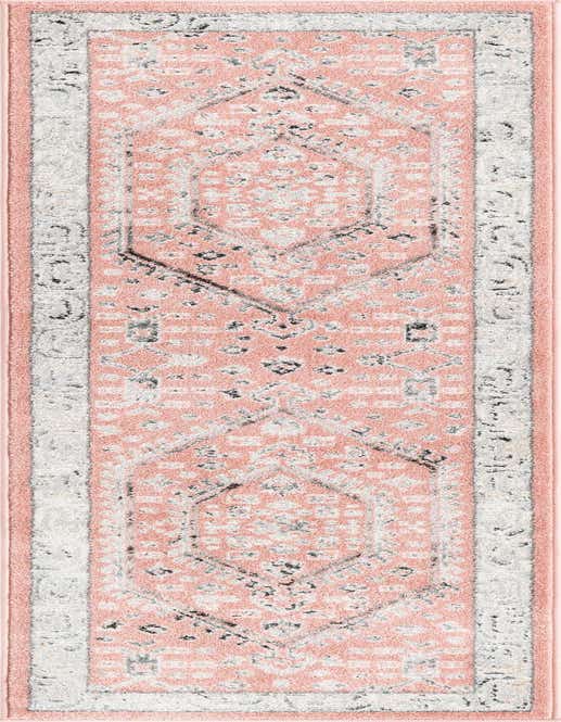A pink 8 ft runner rug with a distressed traditional medallion and tribal pattern in white and gray, perfect for a hallway.