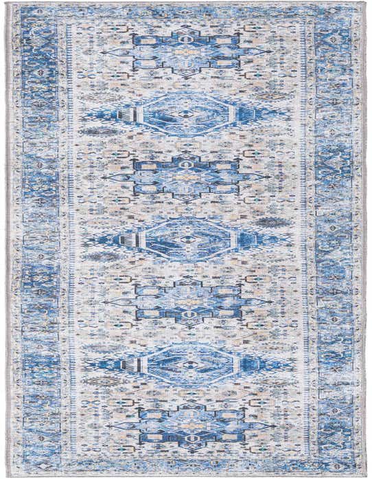 A 10 ft runner rug with a distressed blue, cream, and beige Bohemian-Traditional medallion pattern, ideal for a hallway.