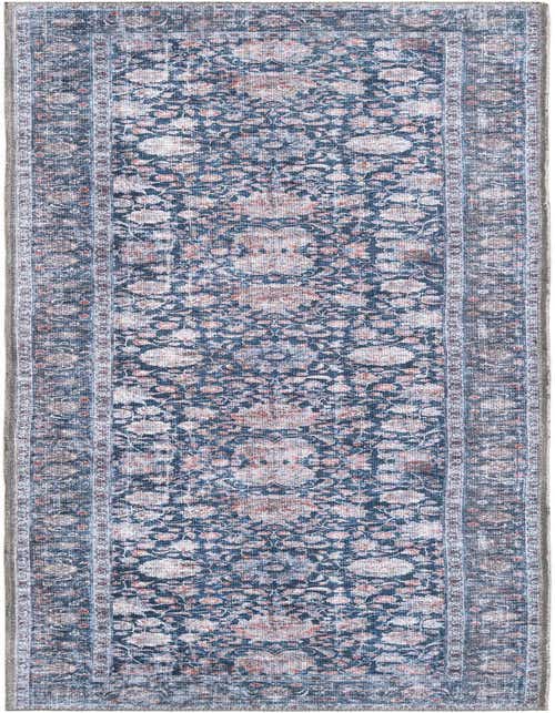 A distressed 8 ft runner rug in royal navy blue with a faded traditional floral pattern and a decorative border.