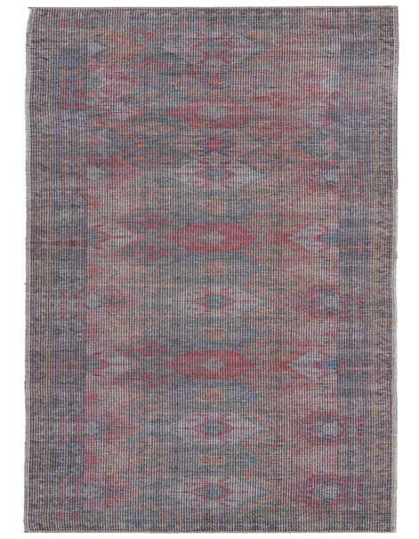 A 12 ft runner rug from the Rugs.com Sisu collection, featuring a distressed traditional tribal pattern in blues, browns, and reds.