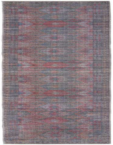 A 14 ft runner rug in blues and browns with a faded traditional tribal pattern, ideal for a hallway.