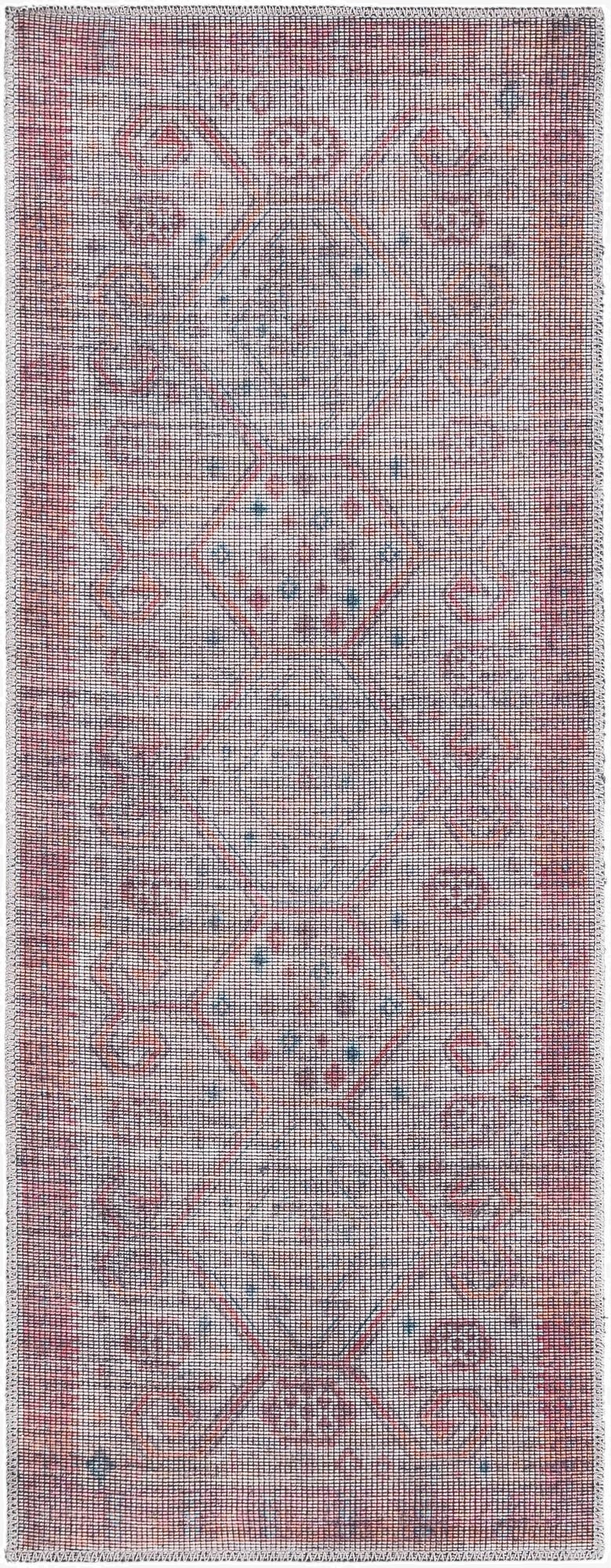 A 5 ft runner rug in rust red and beige, featuring a vintage Southwestern tribal pattern on a flatweave texture.