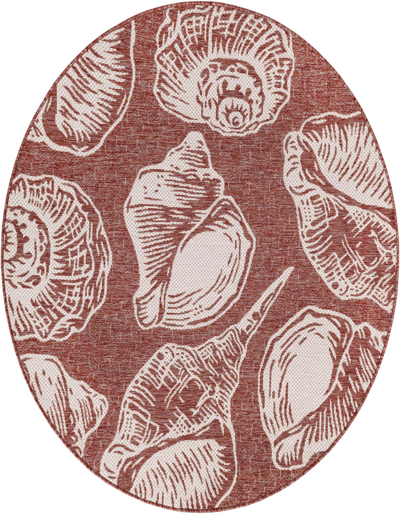 A round rust red and ivory rug with a modern seashell pattern, perfect for a coastal patio or indoor space.