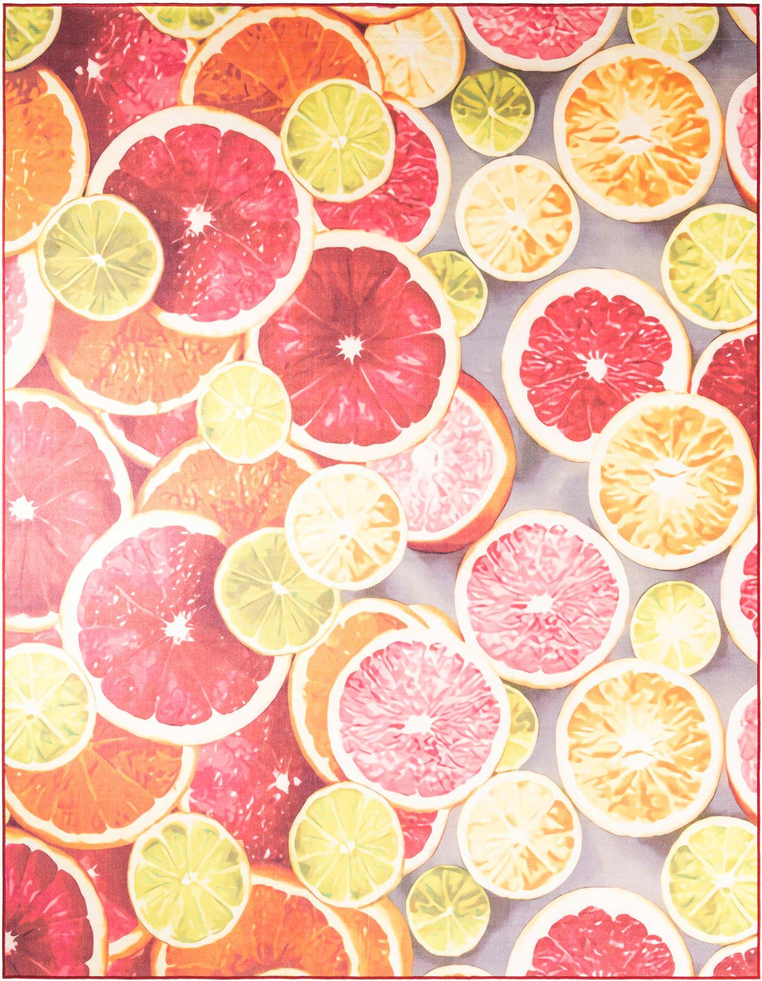 A vibrant 10x13 rectangular rug featuring a modern pattern of various citrus fruit slices in rust red, orange, and yellow.