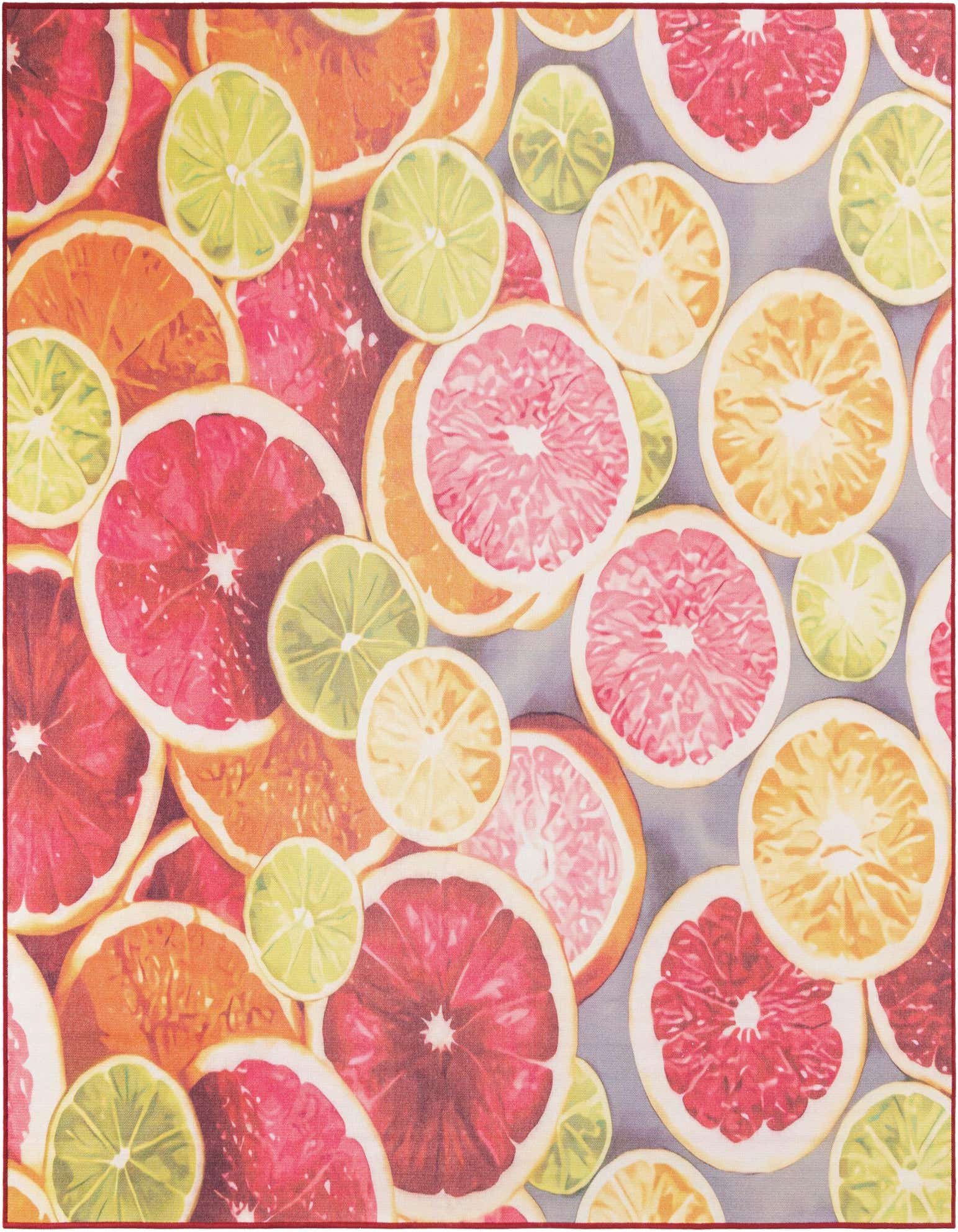A vibrant square rug featuring a modern pattern of sliced citrus fruits like grapefruits, oranges, and limes in shades of rust red, pink, yellow, and lime green.