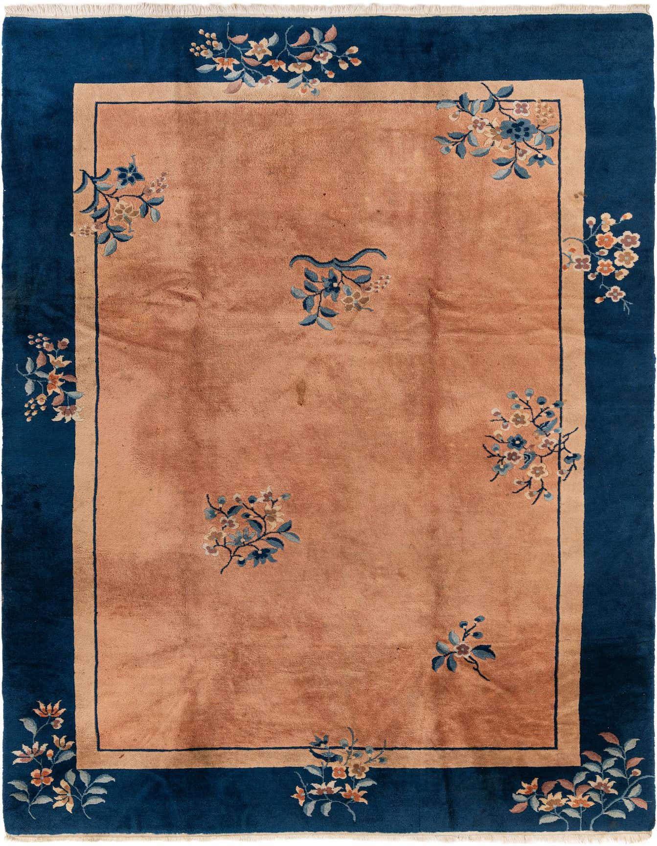 A 7x10 rectangular orange and blue Oriental rug with a floral pattern, ideal for a living room.