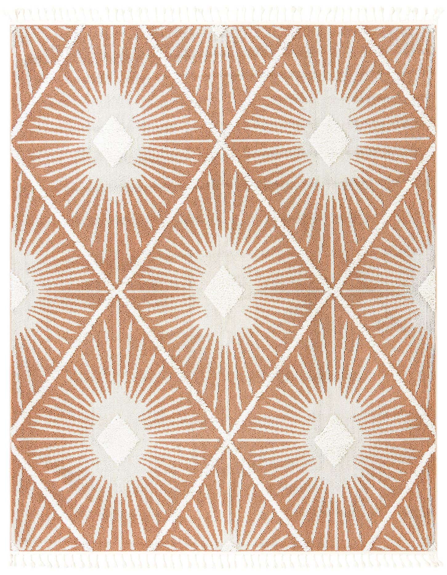 A rectangular 8x10 orange and white bohemian rug with a modern trellis pattern and fringe.
