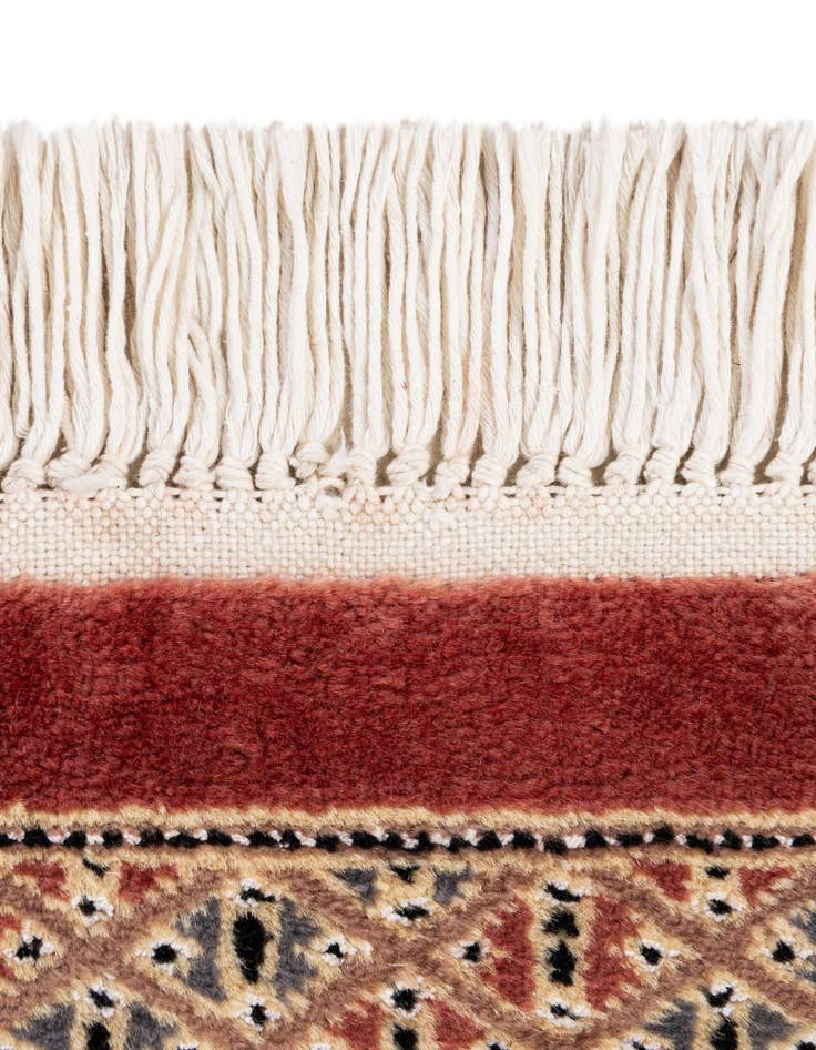 Detail image of  4' 3 x 6' 1  Hand Knotted Bokhara Oriental Wool Rug