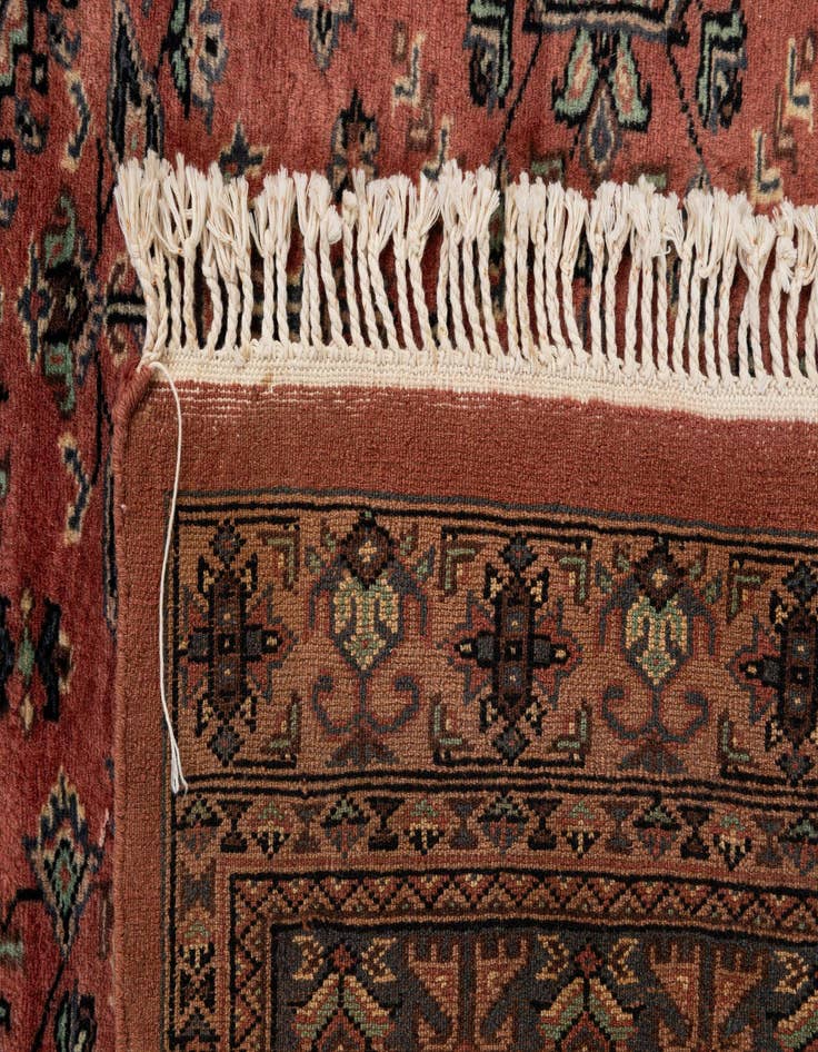 Detail image of  4' 2 x 6' 2  Hand Knotted Bokhara Oriental Wool Rug
