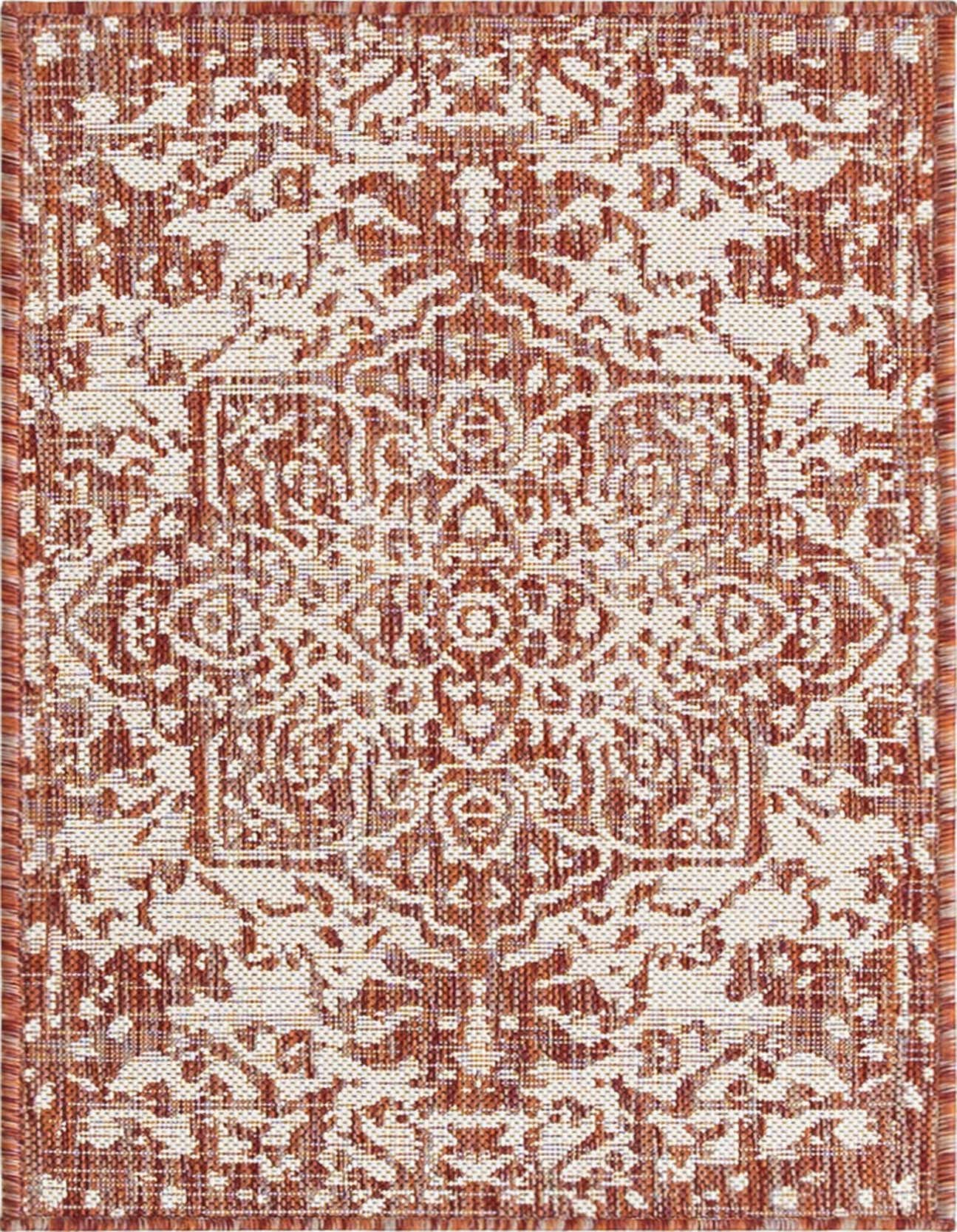 A 2x3 rectangular Jill Zarin Outdoor rug featuring a distressed orange and red Mediterranean medallion pattern on a light background, suitable for a patio.